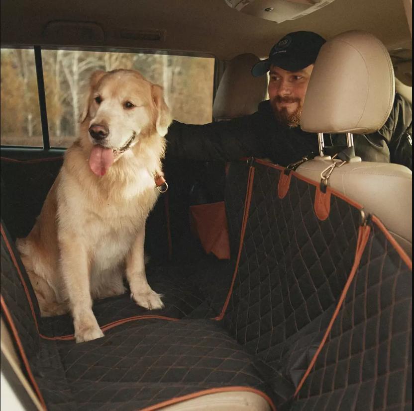 Travel Buddy waterproof dog car seat cover with side boards installed in an SUV